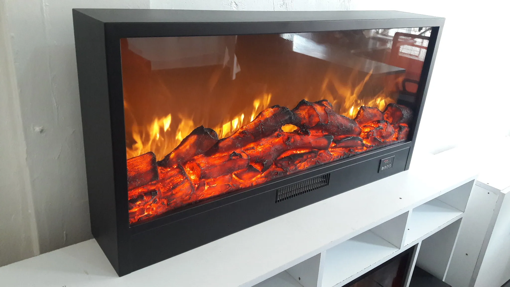 how to tell the difference between vented and unvented gas logs